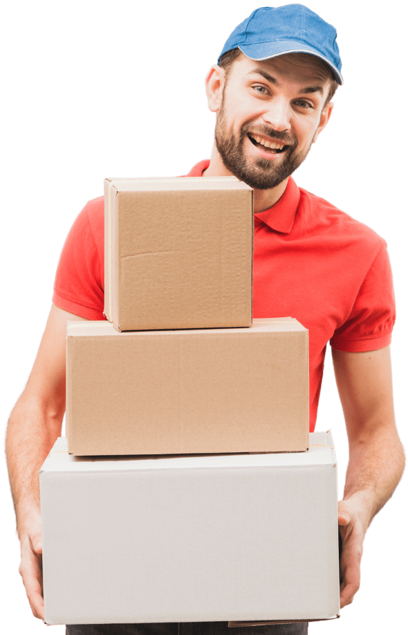 A group of movers and packers carefully wrapping and loading household items into moving boxes in Dubai. The team works efficiently, ensuring a smooth relocation process.